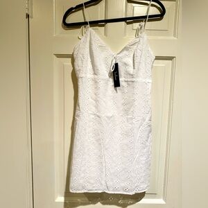 BRAND NEW WITH TAGS! Lulus White Eyelet Cotton Tie-Strap Mini Dress. Large